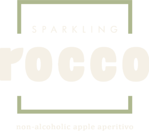 ROCCO-Logo Beige mit zusatz transparent